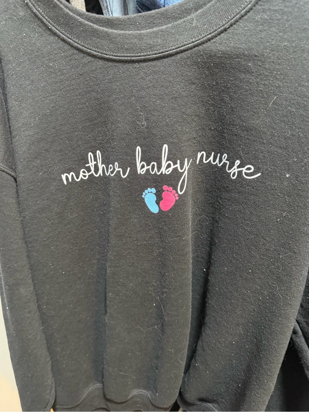Mother Baby Nurse Black Sweatshirt with Pink & Blue Footprints